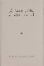 A book with a hole in it