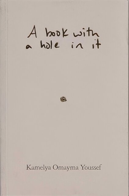 A book with a hole in it